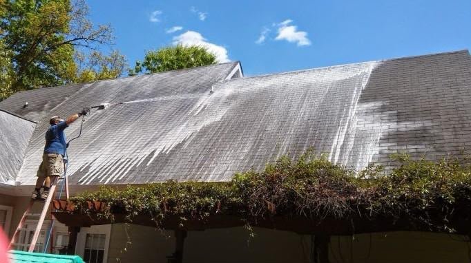 Cleaning stained roof shingles